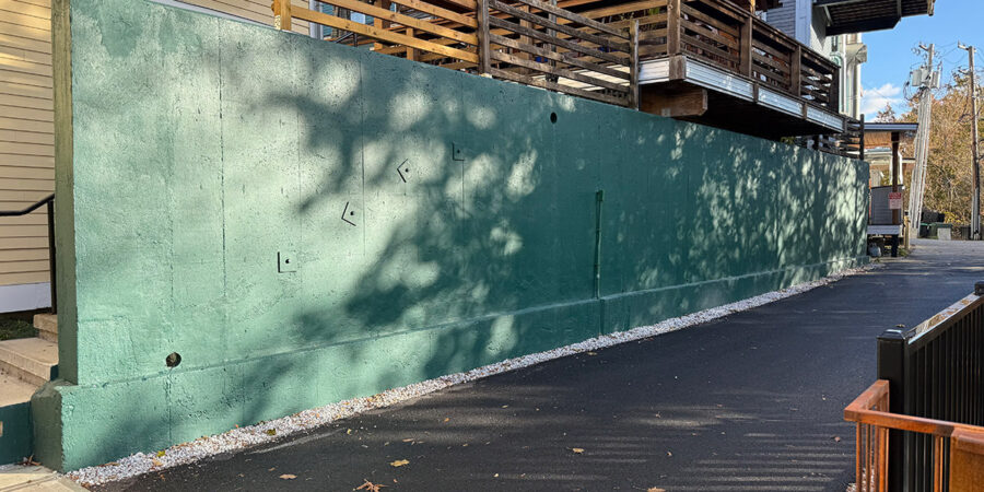 The green wall by the Riverwalk in Manchester, VT, that needs artwork!